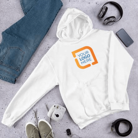 Custom hooded sweatshirt with logo design surrounded by cell phone, headphones, camera, and jeans